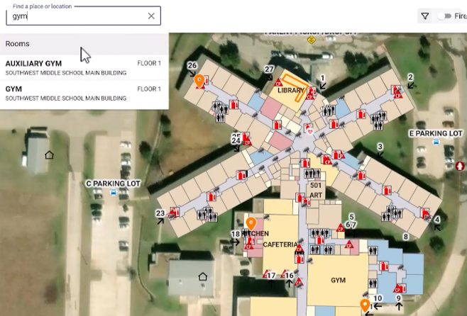 Interactive indoor map of a school campus showing gym, classrooms, and emergency icons.